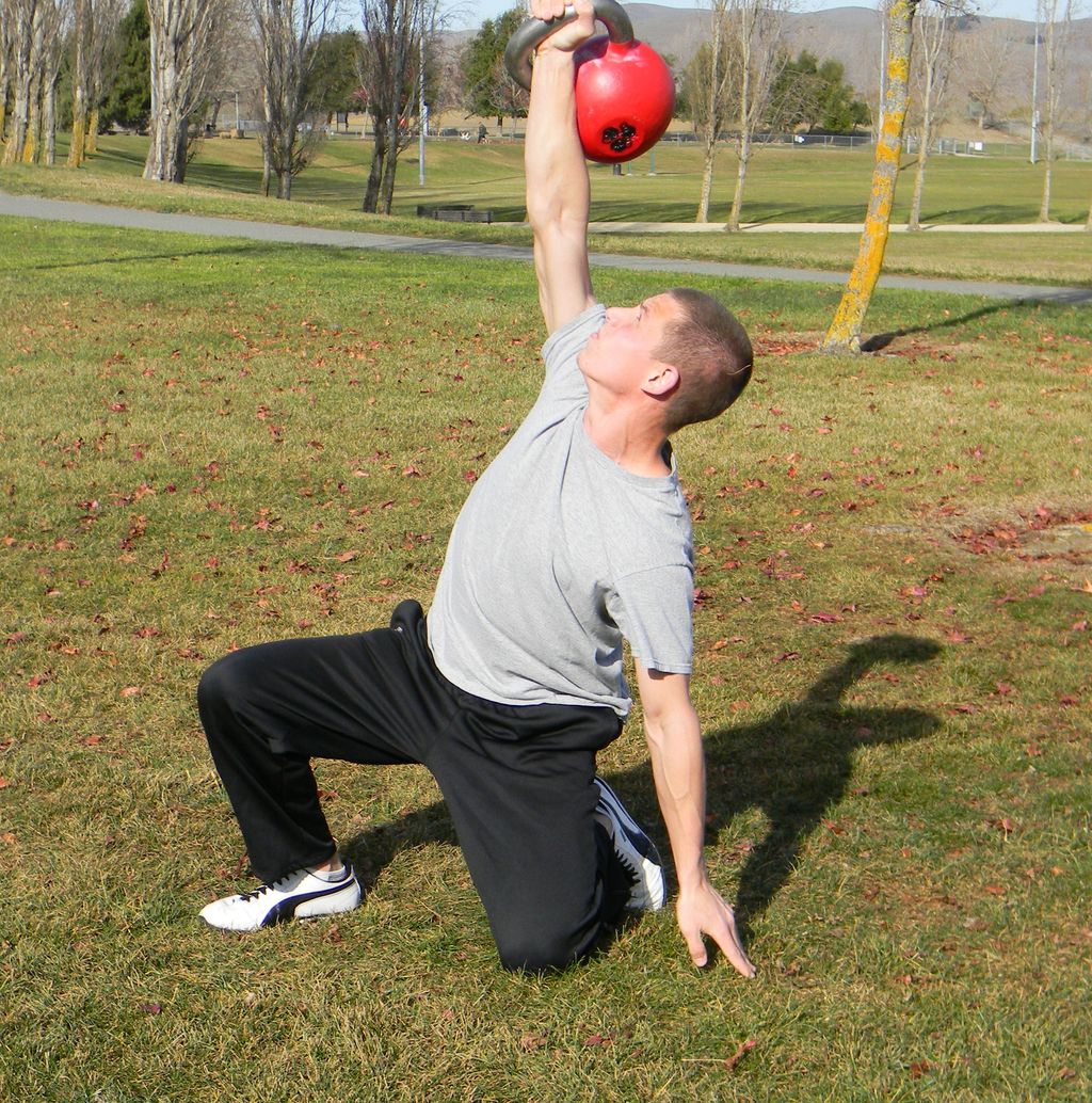 Trainer Jeff Burmann performing the Turkish Get-up
