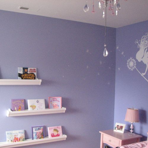 Little girls room!  Book shelves, personalized lib