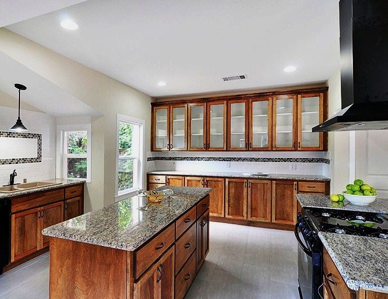 Custom kitchen featuring an entire wall of uppers 