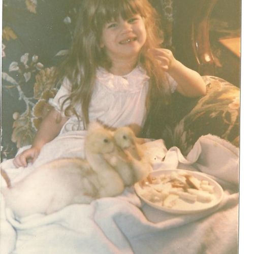 Myself as a child with pet ducks.  I really DO kno
