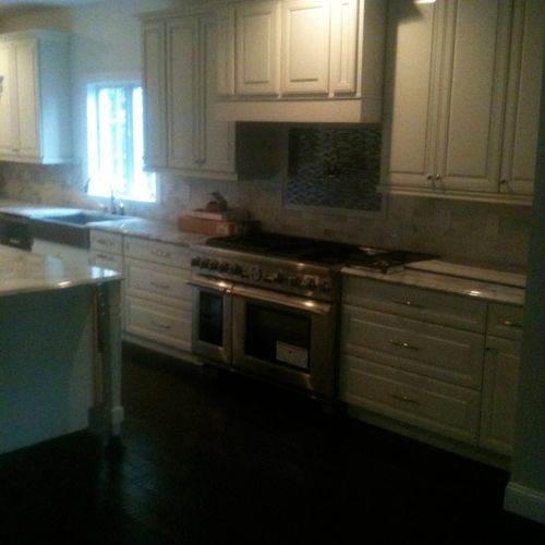 Custom kitchen with marble counter tops and marble