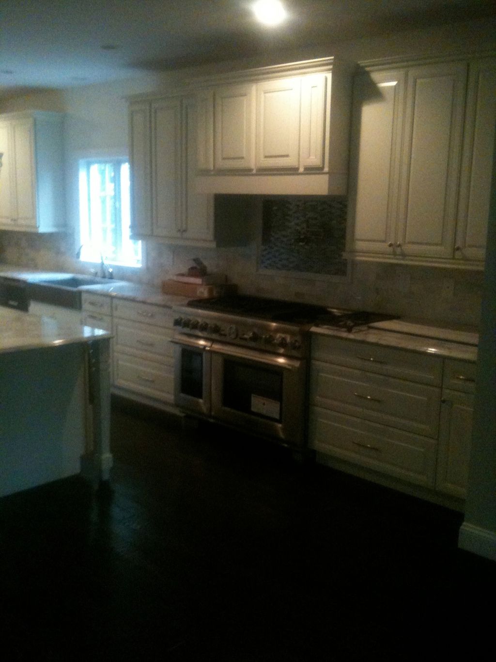 Custom kitchen with marble counter tops and marble