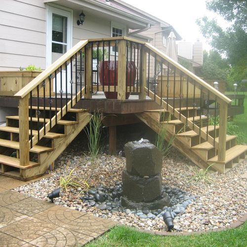 Updated deck stairs and water feature