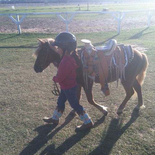 Never too young or too little to learn to ride.  T