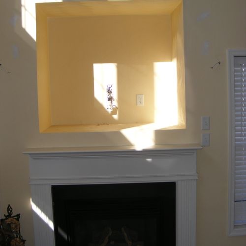 Large cubby hole above fireplace