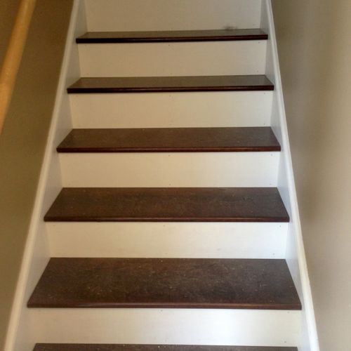 stained oak treads over existing staircase
