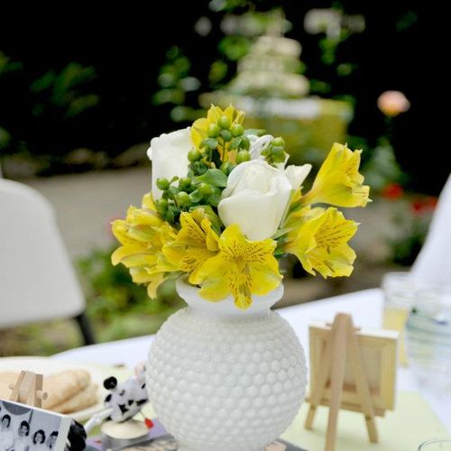 Milk glass and old books gives your event that per