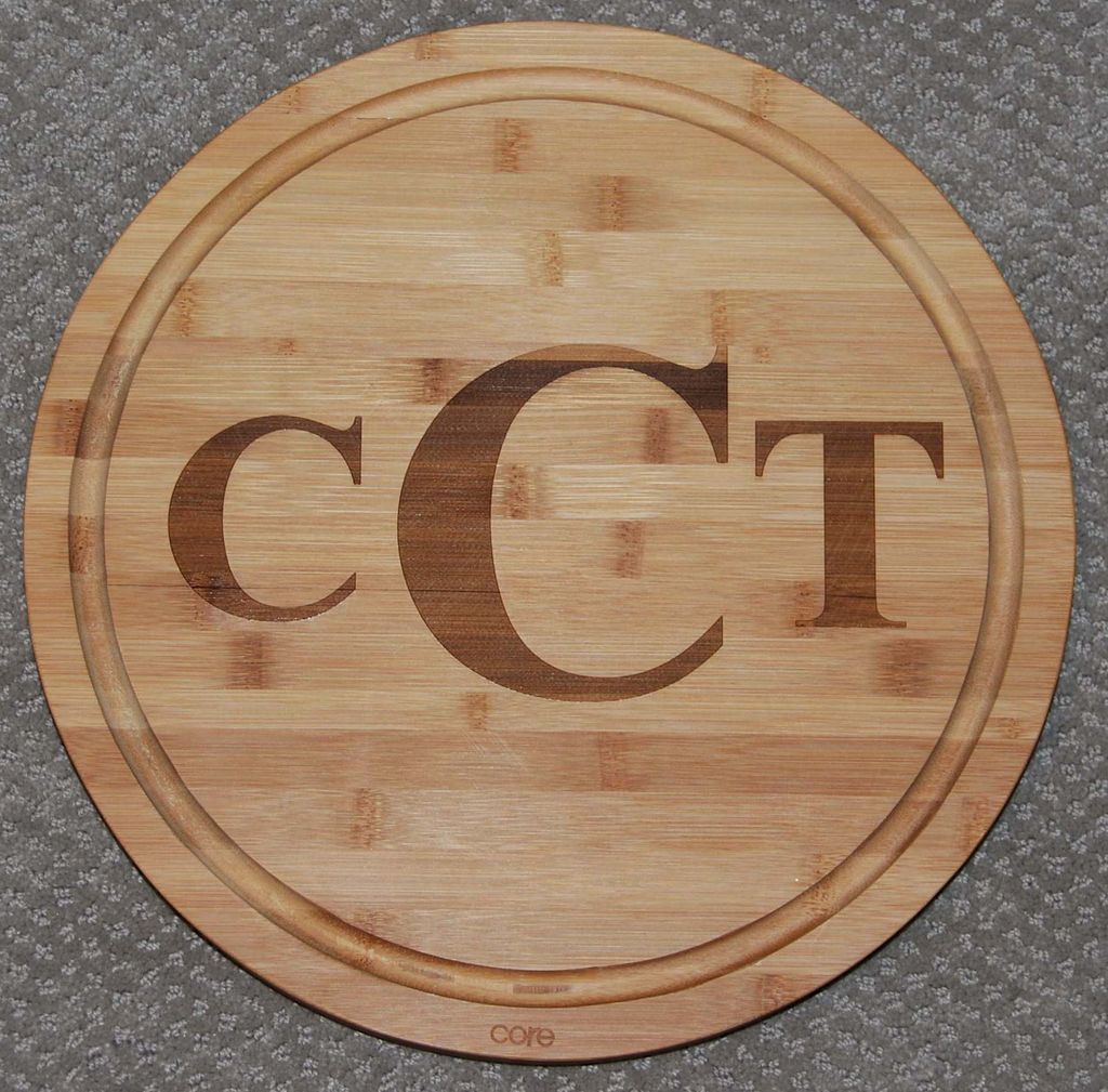 Customer provided 15" round bamboo cutting board. 
