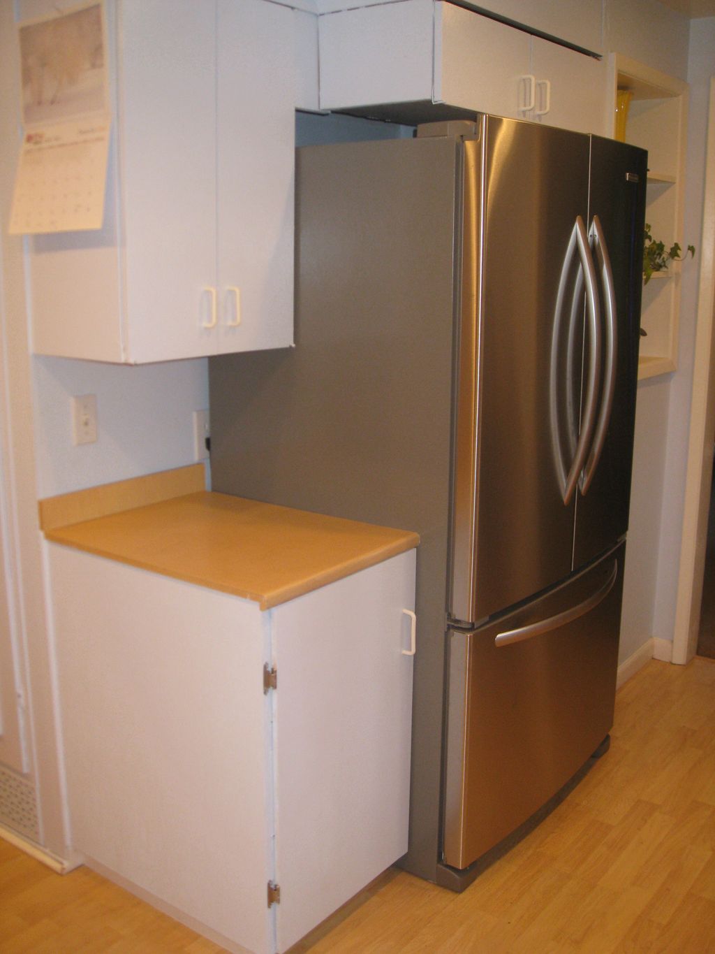 To fit the new refrigerator, I rebuilt the cabinet