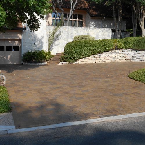 Paver driveway after repair and sealed