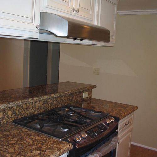 Install complete kitchen, cabinets, counter tops, 