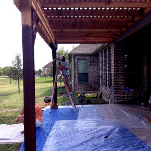 Staining an arbor in Weatherford