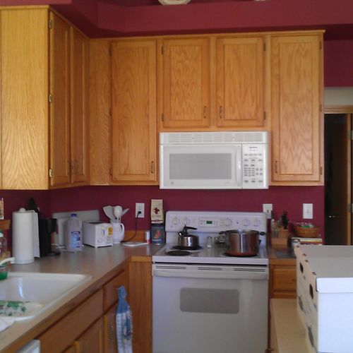 BEFORE We redid this kitchen - wood cabinets