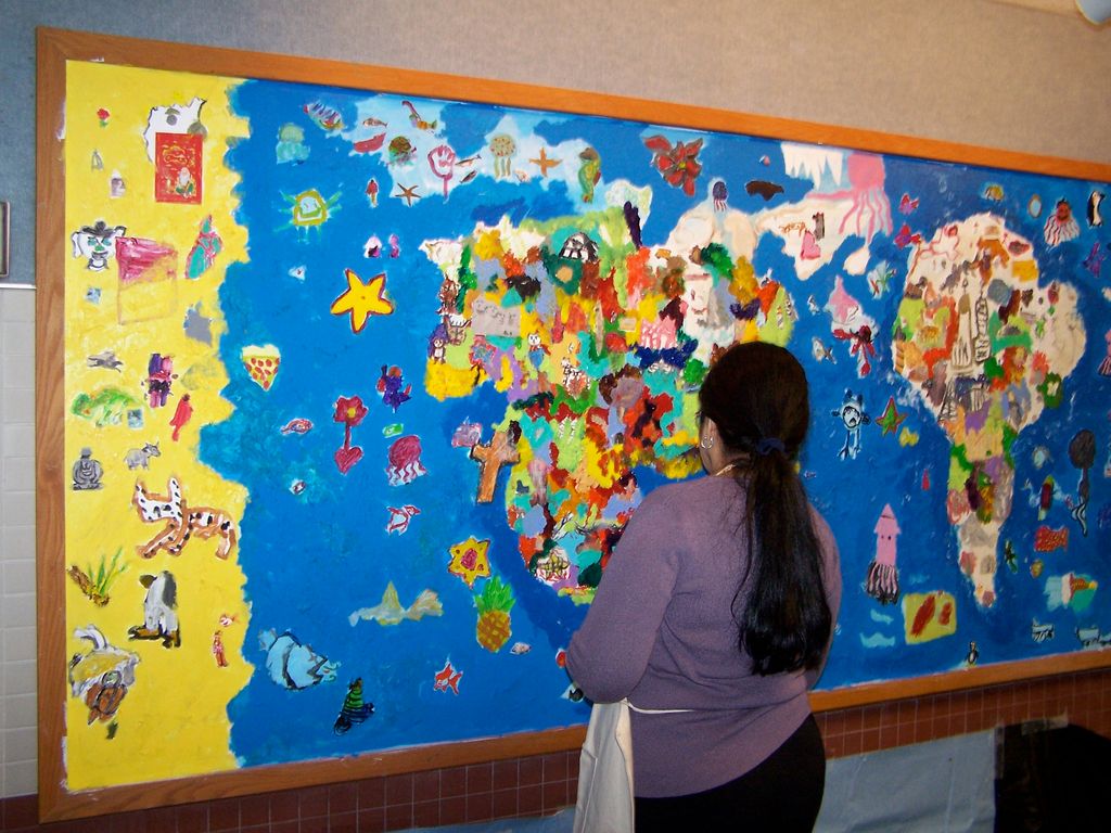 At work on 13.8 ft wall mural at Crooked Creek Ele