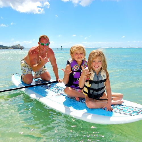 Family fun portraits in the waters of Waikiki.
