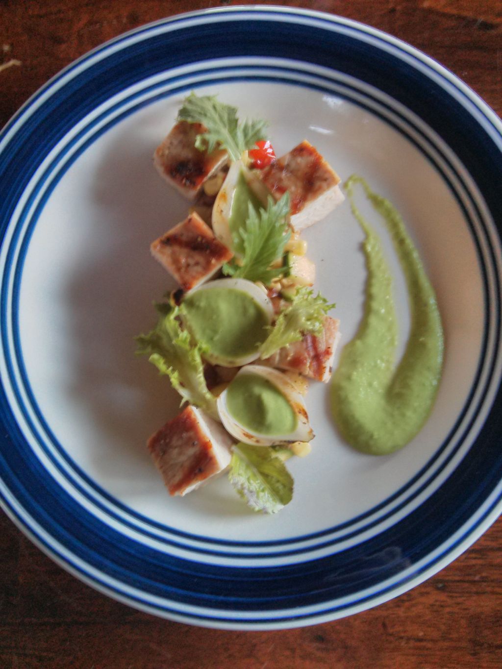 Pork chop, grilled corn succotash, roasted onion p