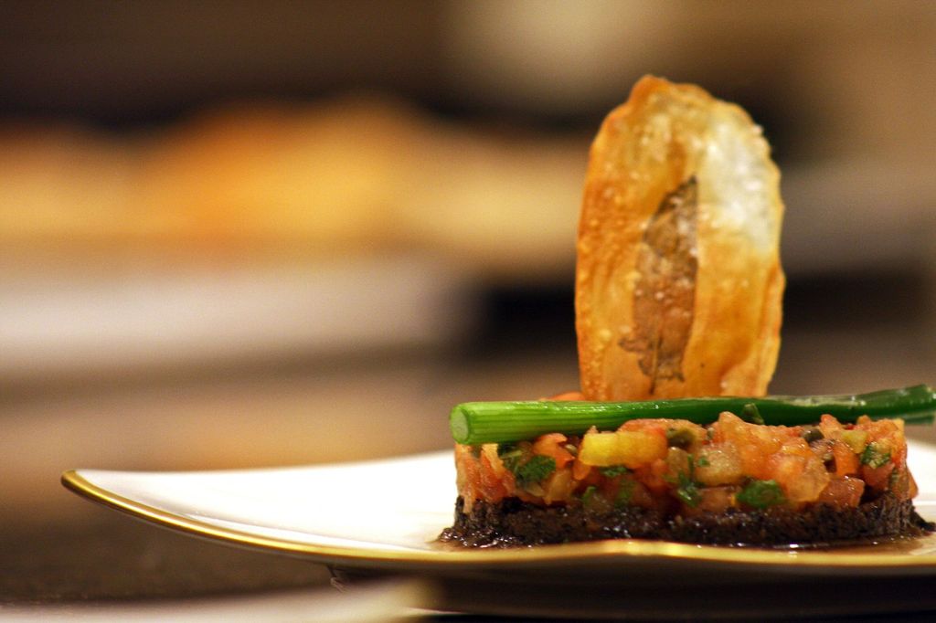 Tomato tartare with olives, scallions, and a sage 