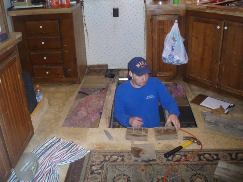 Fixing the floor under the stove because my daught