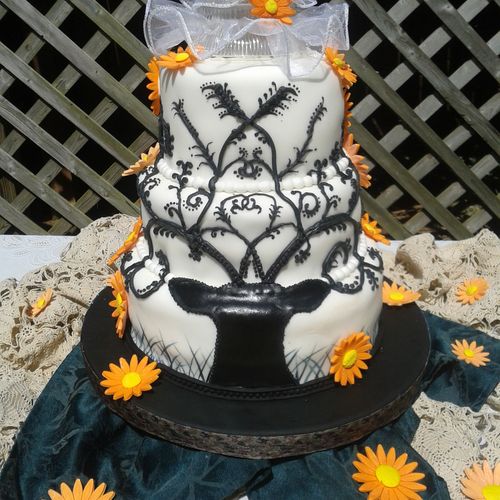 Redneck wedding cake with a deer silhouette