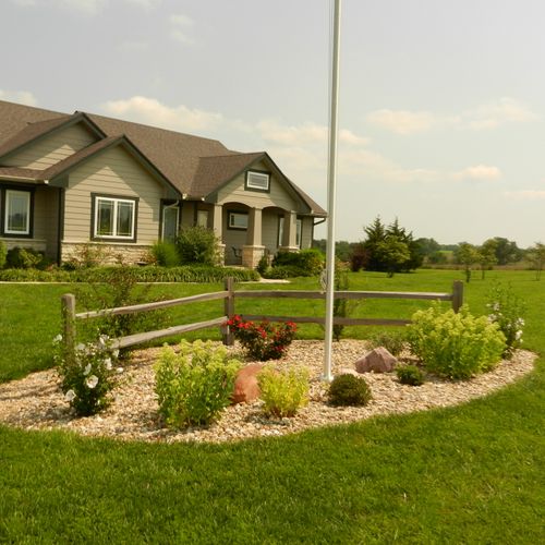 We installed this flagpole and landscaped the area