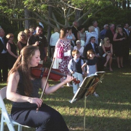 Violinist Christine Young performing at a wedding 