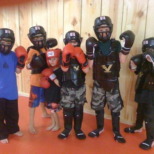 Our Kids learn striking techniques from Western Bo
