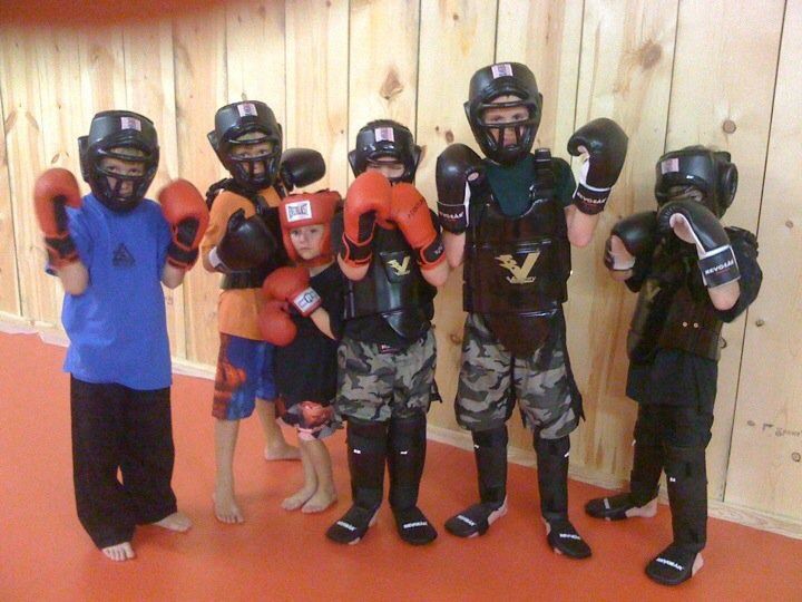 Our Kids learn striking techniques from Western Bo