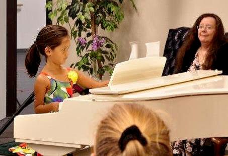 Students learn to perform at fun, low-stress piano