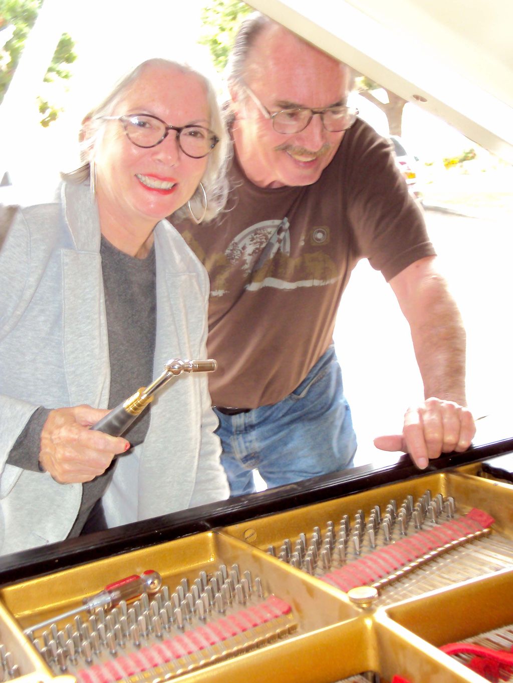 Me teaching my sister how to tune her own piano in