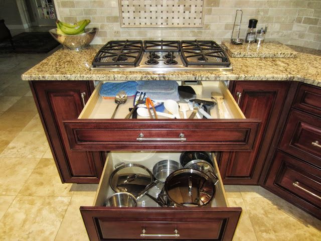 pans and utensils right under the cook top? why no