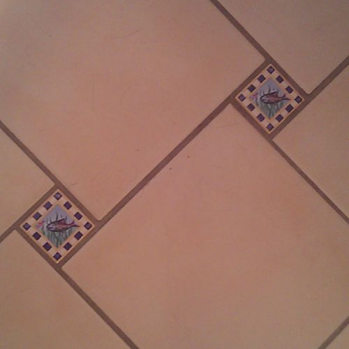 Picture 1: Custom tile work in a bathroom includin