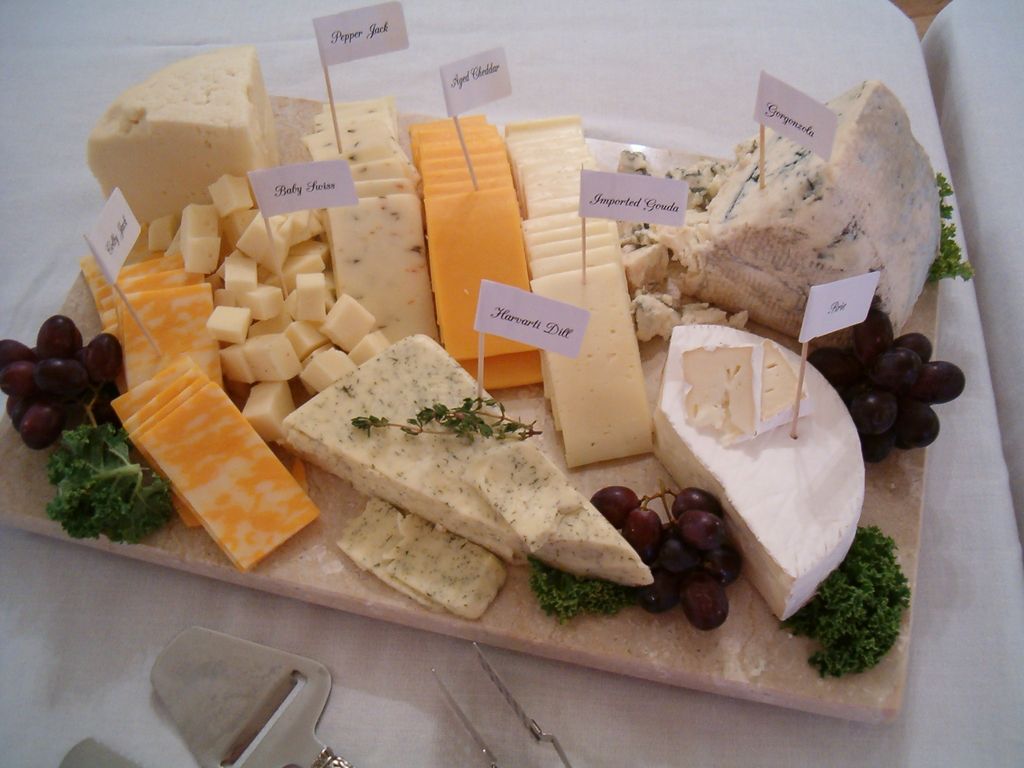 Delicious Cheese Tray served on a marble slab