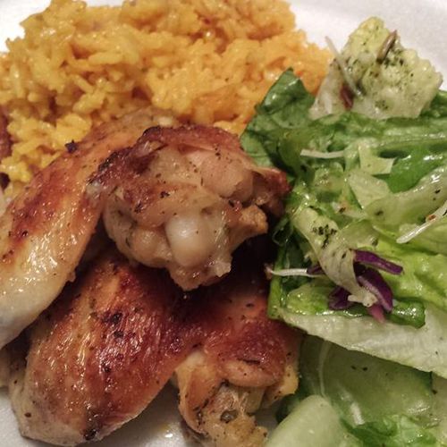 roasted chicken wings, saffron rice and ceasar sal
