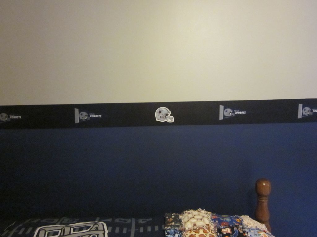 Accent wall done for a little Cowboy fan.