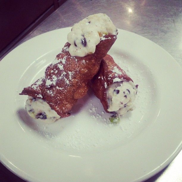 Deep fried cocoa canolli shells with a sweet masca