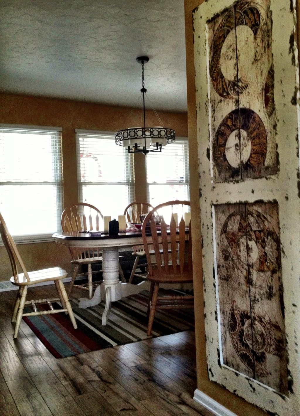 DIning with transitional art from kitchen - Antiqu