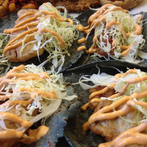 Fish tacos with chipotle mayo and shredded cabbage