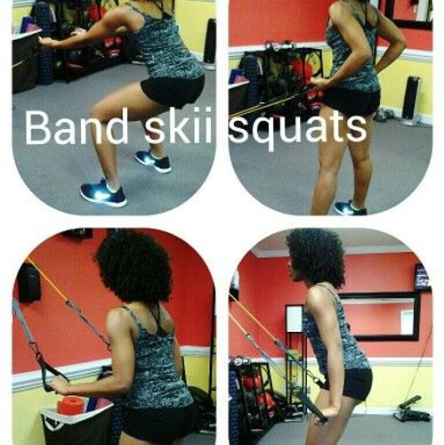 Glute workout for the day..Skii squats with bands