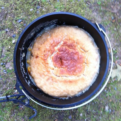 Old fashioned Dutch oven Peach Cobbler.  Just like