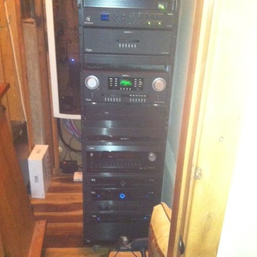 Rack system with Crestron components.  Distributed