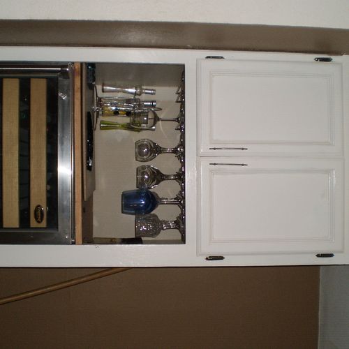 kitchen cabinet with wine cooler built in and wine