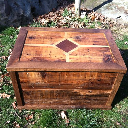 Barnwood chest with inlaid top.