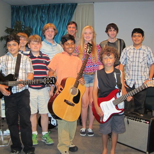 Mike McNamara with guitar students at June 2013 re