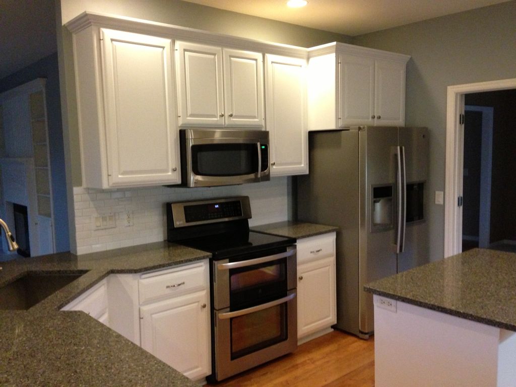 We painted these old wooden cabinets.  Talk about 