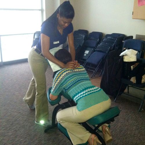 Chair massage on a teacher