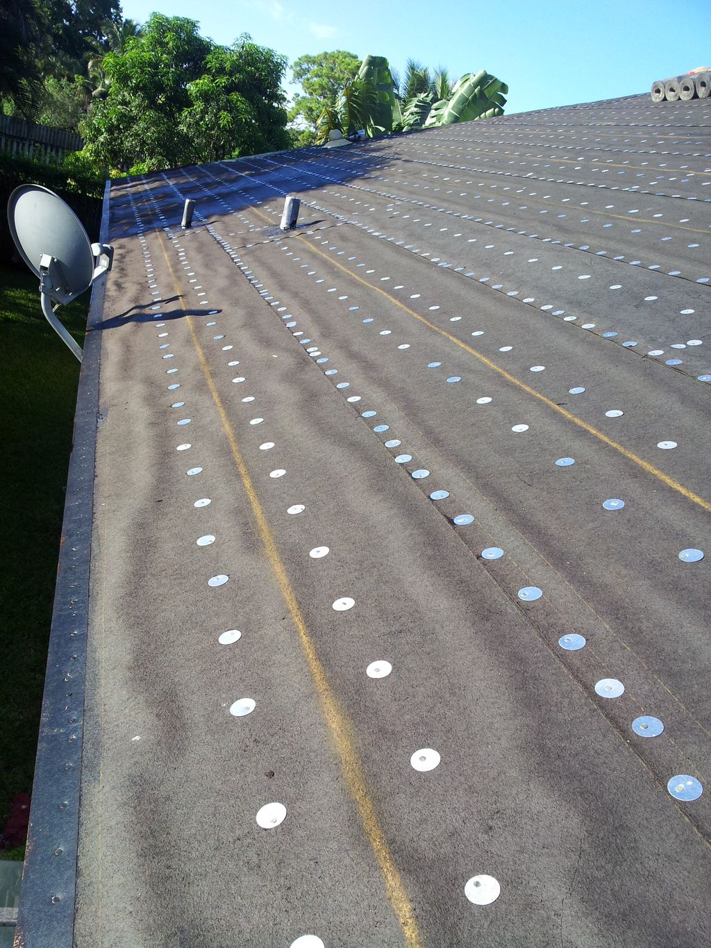 TILE REROOF: DRY IN WITH 30LB AND PRIMED EDGE META