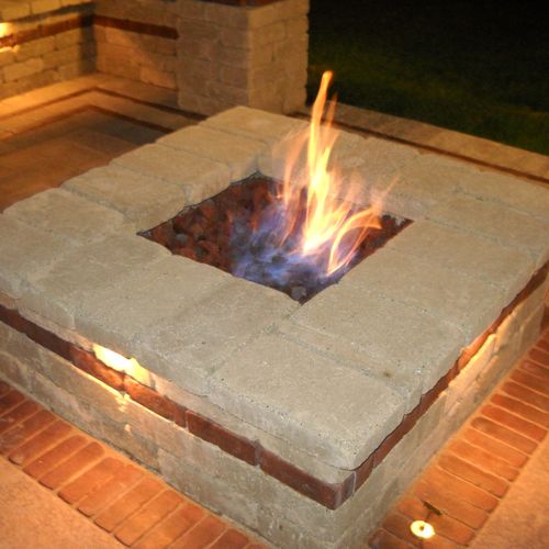 Stone gas fire pit with LED under lighting, pavers