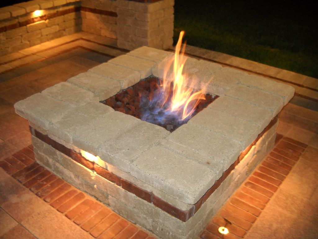 Stone gas fire pit with LED under lighting, pavers