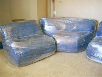 Professional shrink wrap of furniture to prevent a