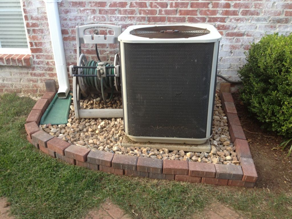 Rock bed & brick border installation.